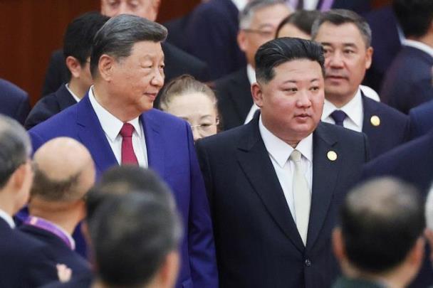 시진핑 중국 국가주석, 김정은 북한 국무위원장 <사진=TASS/연합뉴스>